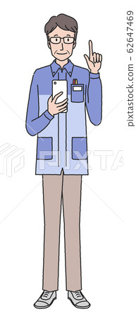 Convenience store clerk using a smartphone Convenience store clerk using a smartphone 62647469
