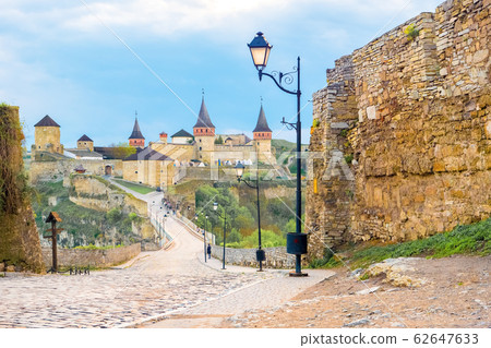 The remains of Castle in old town of Ukraine, Kamenets-Podilsk. Spiers of the castle. Famous 62647633