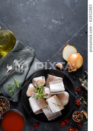 Raw fresh sliced hake fish with ingredients for Raw fresh sliced hake fish with ingredients for 62652865
