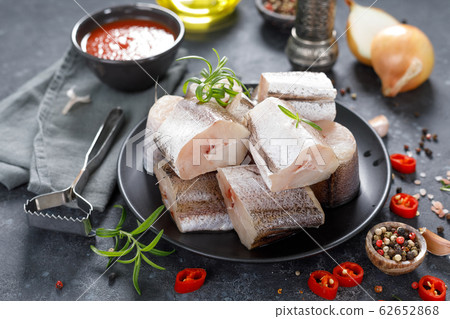 Raw fresh sliced hake fish with ingredients for Raw fresh sliced hake fish with ingredients for 62652868