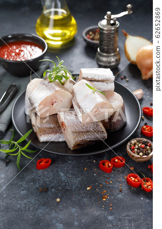 Raw fresh sliced hake fish with ingredients for Raw fresh sliced hake fish with ingredients for 62652869