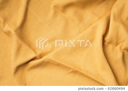 Background texture of yellow fabric texture. Copy space. Top View of cloth textile surface. Abstract backdrop for design. Background texture of yellow fabric texture. Copy space. Top View of cloth textile surface. Abstract backdrop for design. 62660494