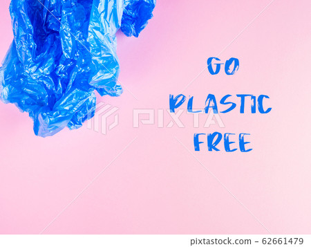 Go plastic free concept plastic bag on pink 62661479