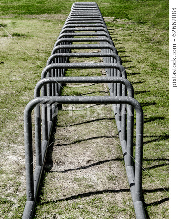 Empty bicycle stand of the side, abstract Empty bicycle stand of the side, abstract 62662083