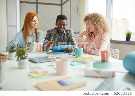 Creative Young People Discussing Project Creative Young People Discussing Project 62663156