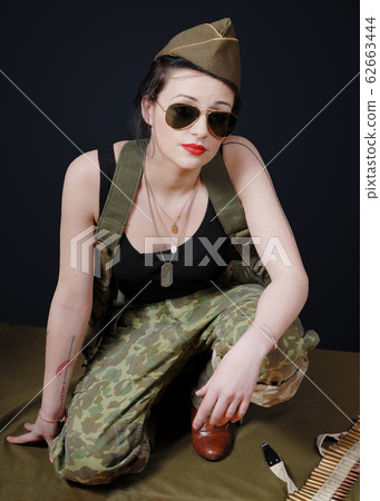 sexy woman in military uniform posing sexy woman in military uniform posing 62663444