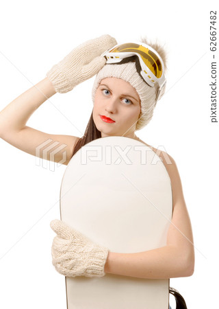 beautiful woman with a snowboard in studio beautiful woman with a snowboard in studio 62667482