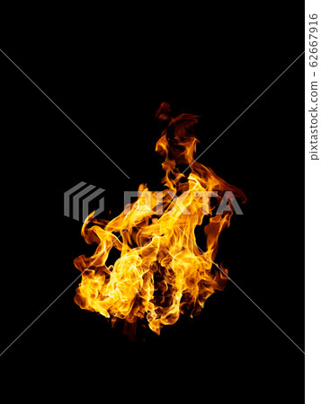 real and hot flames are burning on a black 62667916