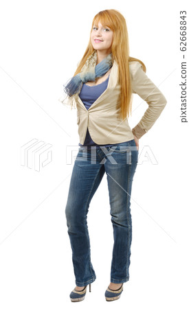 beautiful young and redhead businesswoman in jeans 62668843
