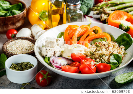 Vegan lunch bowl with quinoa, broccoli, hummus  62669798