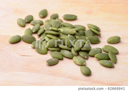 Green shelled pumpkin seeds Green shelled pumpkin seeds 62669841