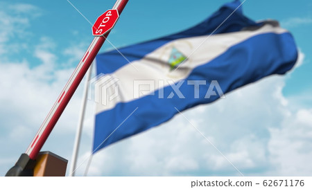 Barrier gate being opened with flag of Nicaragua as a background. Nicaraguan Free border crossing or lifting a ban. 3D rendering Barrier gate being opened with flag of Nicaragua as a background. Nicaraguan Free border crossing or lifting a ban. 3D rendering 62671176
