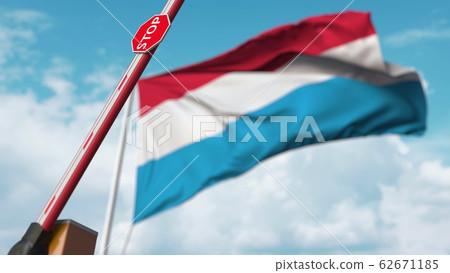 Barrier gate being opened with flag of Luxembourg as a background. Luxembourgian Free border crossing or lifting a ban. 3D rendering Barrier gate being opened with flag of Luxembourg as a background. Luxembourgian Free border crossing or lifting a ban. 3D rendering 62671185