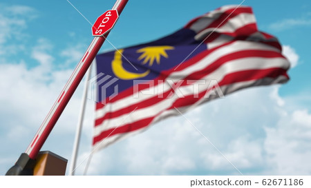 Barrier gate being opened with flag of Malaysia as a background. Malaysian Free border crossing or lifting a ban. 3D rendering Barrier gate being opened with flag of Malaysia as a background. Malaysian Free border crossing or lifting a ban. 3D rendering 62671186