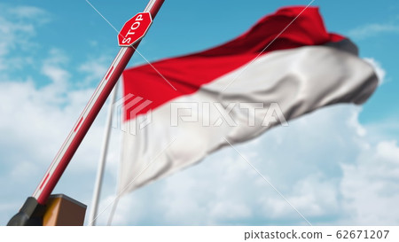 Open boom gate on the Indonesian flag background. Free entry or lifting a ban in Indonesia. 3D rendering Open boom gate on the Indonesian flag background. Free entry or lifting a ban in Indonesia. 3D rendering 62671207