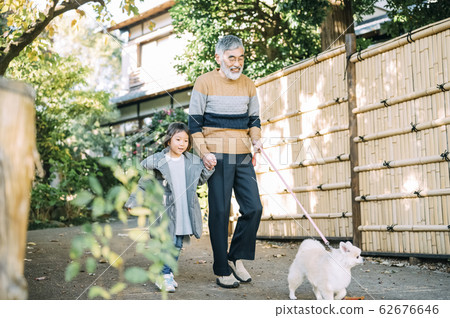 Senior with girl and dog Senior with girl and dog 62676646