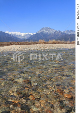 Azumino Clear Stream and Northern Alps in Early Spring Azumino Clear Stream and Northern Alps in Early Spring 62682673