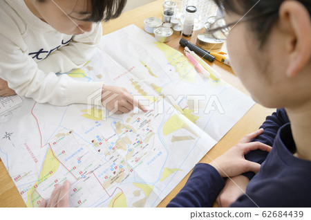 Family members checking evacuation routes Family members checking evacuation routes 62684439