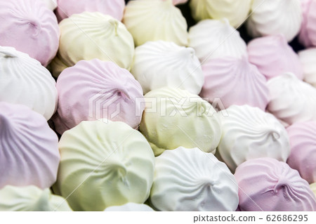 different colors of marshmallows. Marshmallow background different colors of marshmallows. Marshmallow background 62686295