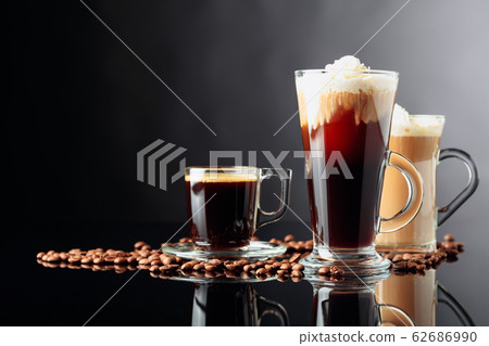 Coffee drinks and coffee beans on black Coffee drinks and coffee beans on black 62686990