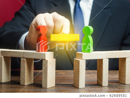 A man mediates in the negotiation process. Compromise and dispute resolution. Build bridges improve relationships. Communication mediation between conflicting parties. escape escalations of conflicts 62689581