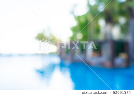 Abstract blur and defocus outdoor swimming pool in hotel resort for background Abstract blur and defocus outdoor swimming pool in hotel resort for background 62691574