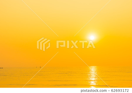 Beautiful tropical sea ocean beach at sunrise or sunset time Beautiful tropical sea ocean beach at sunrise or sunset time 62693172