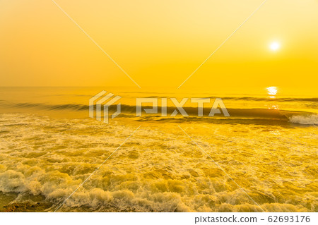 Beautiful tropical sea ocean beach at sunrise or sunset time Beautiful tropical sea ocean beach at sunrise or sunset time 62693176