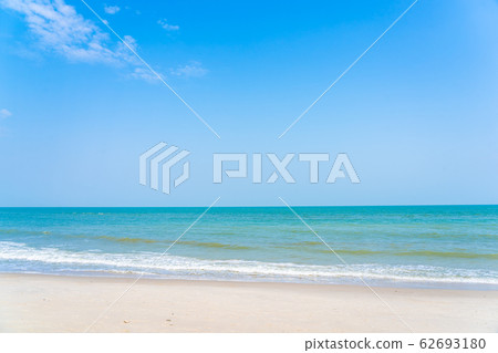 Beautiful tropical sea ocean around beach with blue sky white cloud Beautiful tropical sea ocean around beach with blue sky white cloud 62693180