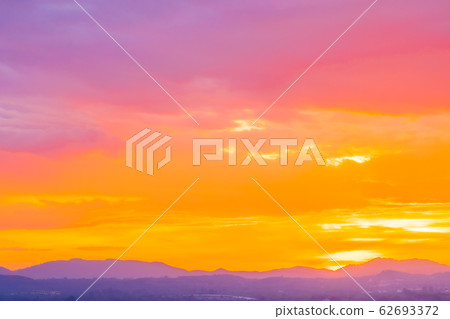 Beautiful landscape with sunrise or sunset over mountain Beautiful landscape with sunrise or sunset over mountain 62693372