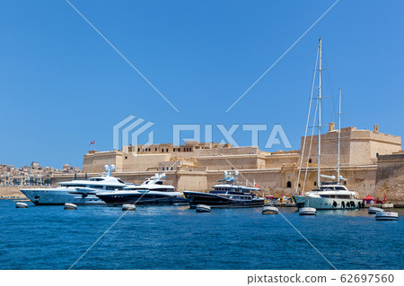 Motor yachts in the port 62697560