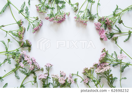 Floral pattern of purple and pink flowers on grey. Floral pattern of purple and pink flowers on grey. 62698232