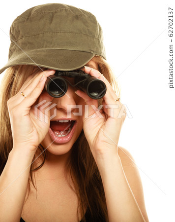 woman in military clothes with binoculars woman in military clothes with binoculars 62702137