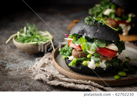 Veggie mushroom black burgers. Veggie mushroom black burgers. 62702230