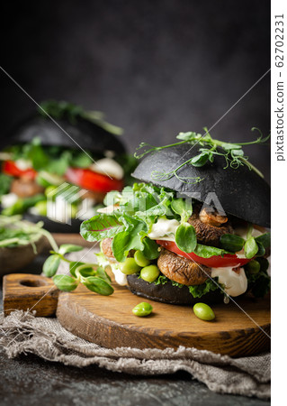 Veggie mushroom black burgers. 62702231