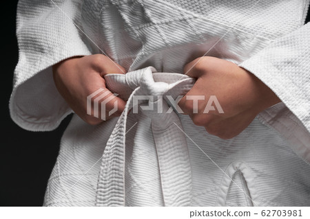 hands close up of a teenager athlete, dressed in 62703981