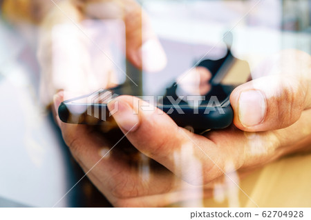 Hands with mobile 62704928