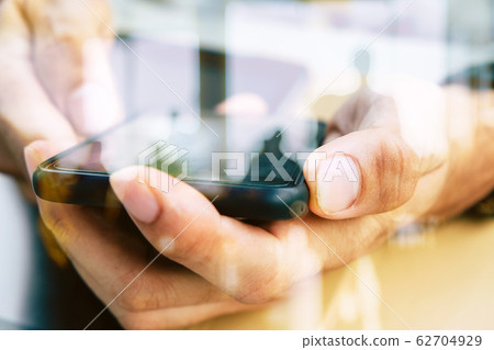 Hands with mobile 62704929