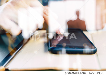 Hands with mobile Hands with mobile 62704933