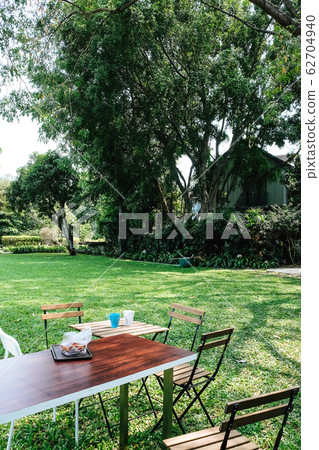 Table setting for a garden lunch Table setting for a garden lunch 62704940