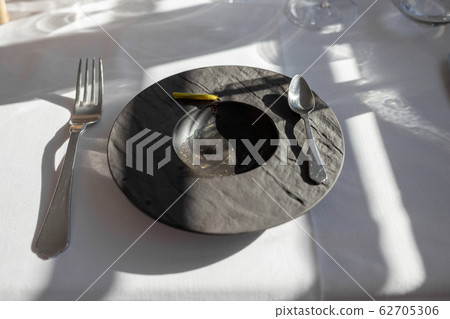 empty black plate in a restaurant, after Gourmet food 62705306