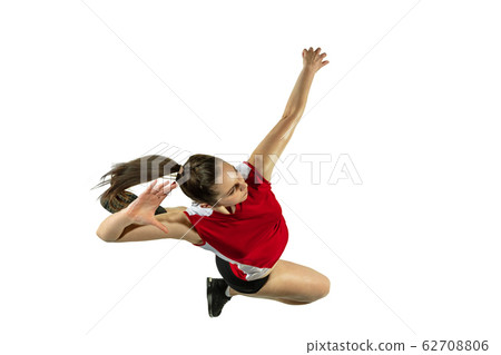 Young female volleyball player isolated on white studio background in flight and motion 62708806