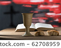 Still life with chalice of wine and bread 62708959