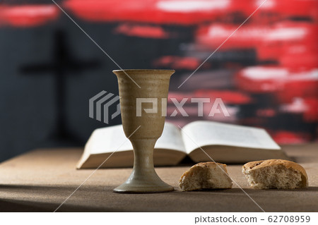 Still life with chalice of wine and bread 62708959