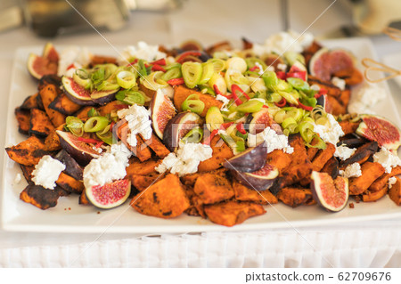 Grilled vegetables and chicken on wooden table overhead shot 62709676