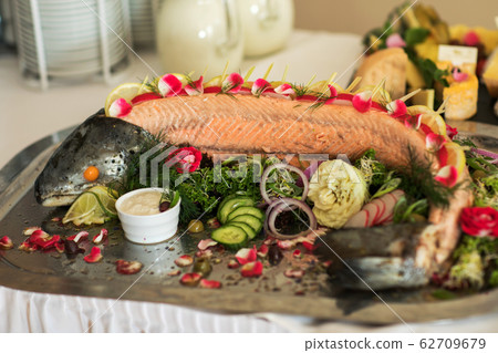 Baked salmon with a spicy crust Baked salmon with a spicy crust 62709679