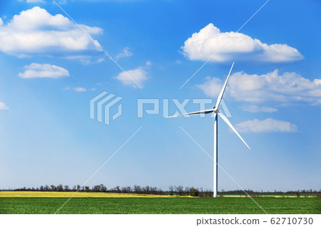 Wind turbine of blue sky with clouds background 62710730