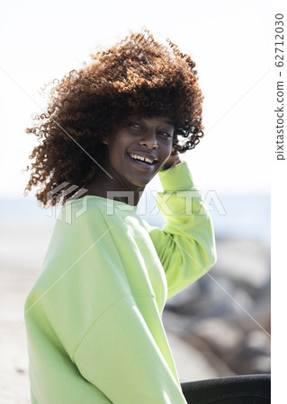 Portrait of a beautiful afro american woman Portrait of a beautiful afro american woman 62712030