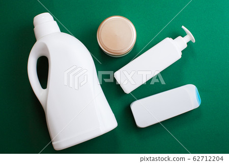 Detergent bottle pattern. White plastic bottles of cleaning products Detergent bottle pattern. White plastic bottles of cleaning products 62712204