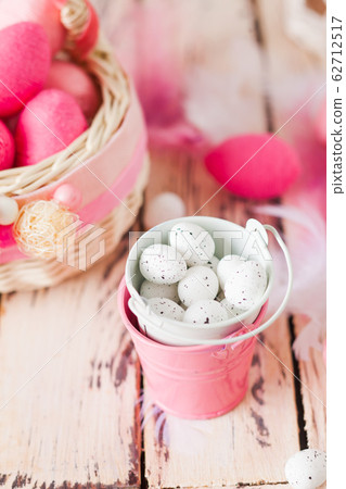 Top view tiny quail eggs in small bucket Top view tiny quail eggs in small bucket 62712517